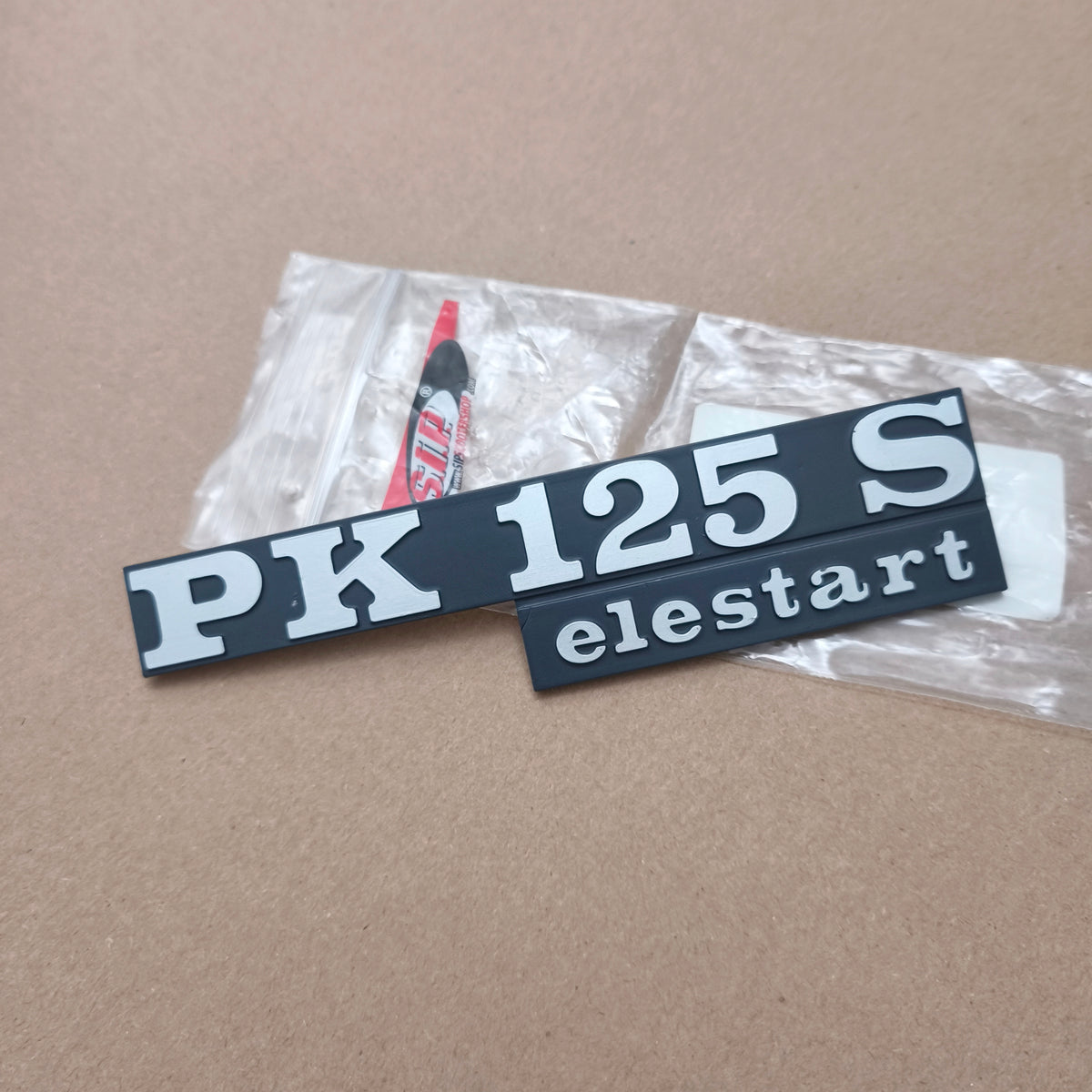 Emblem Tepong PK 125 S